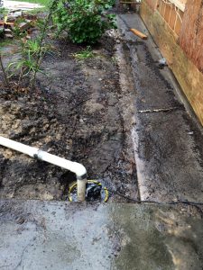 A simple sump pump and draining keeps the water from backing up. 