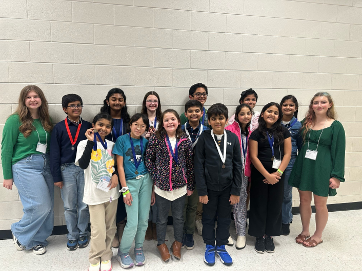 Forsyth County 4-H Cloverleaf DPA participants and teen leaders show off their medals at the end of the Awards Ceremony in Newton County. 
