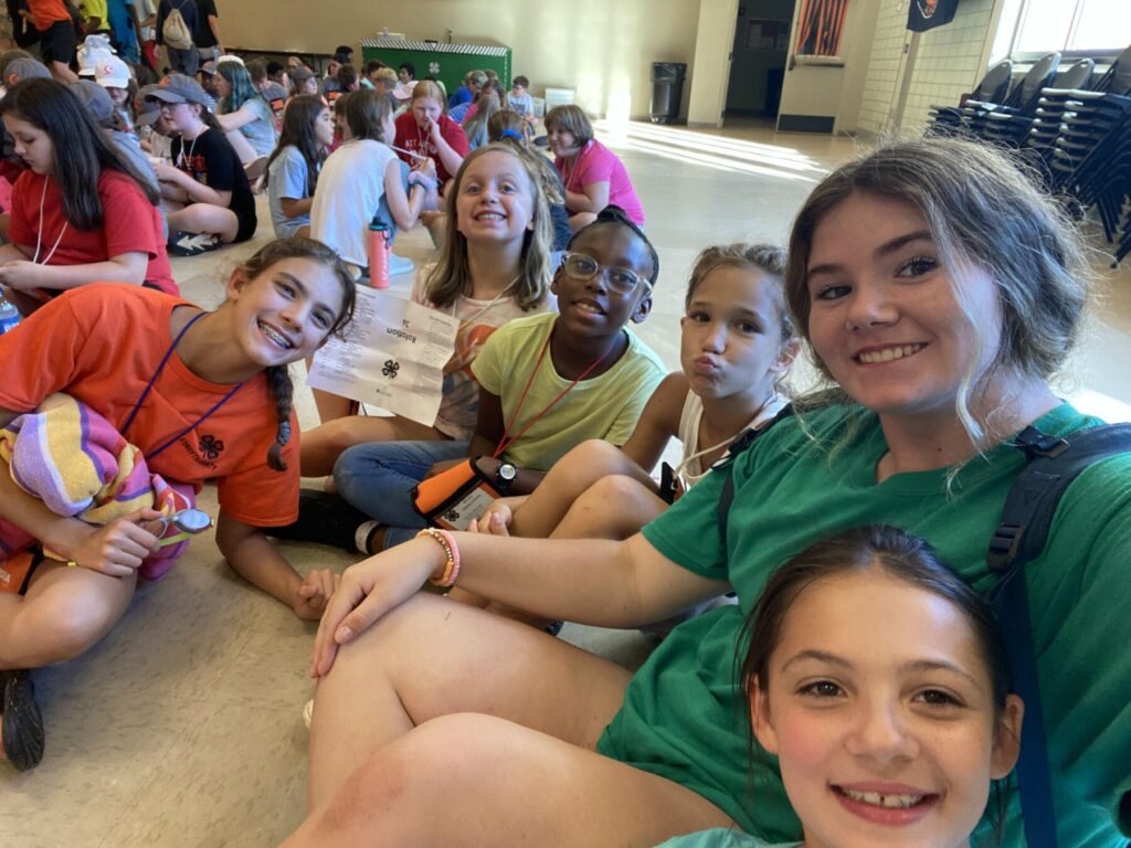 A selfie taken by a teen leader of herself and a group of students.