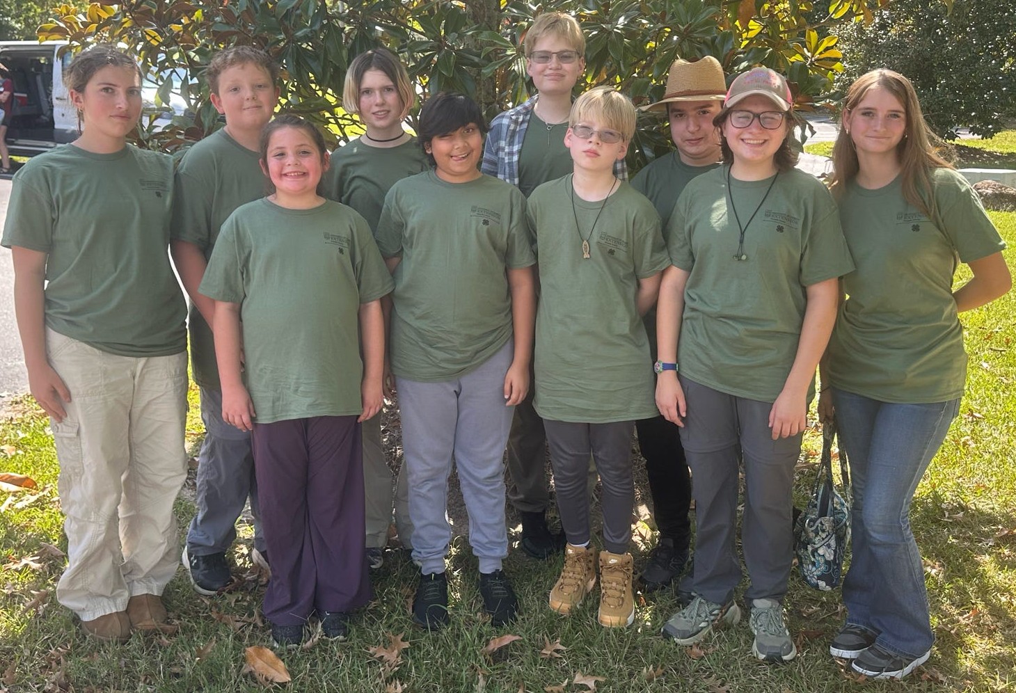 A group of students posing for a group photo at the forestry competition