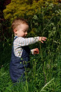 Kid plays outside