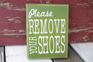 Sign: Please remove your shoes