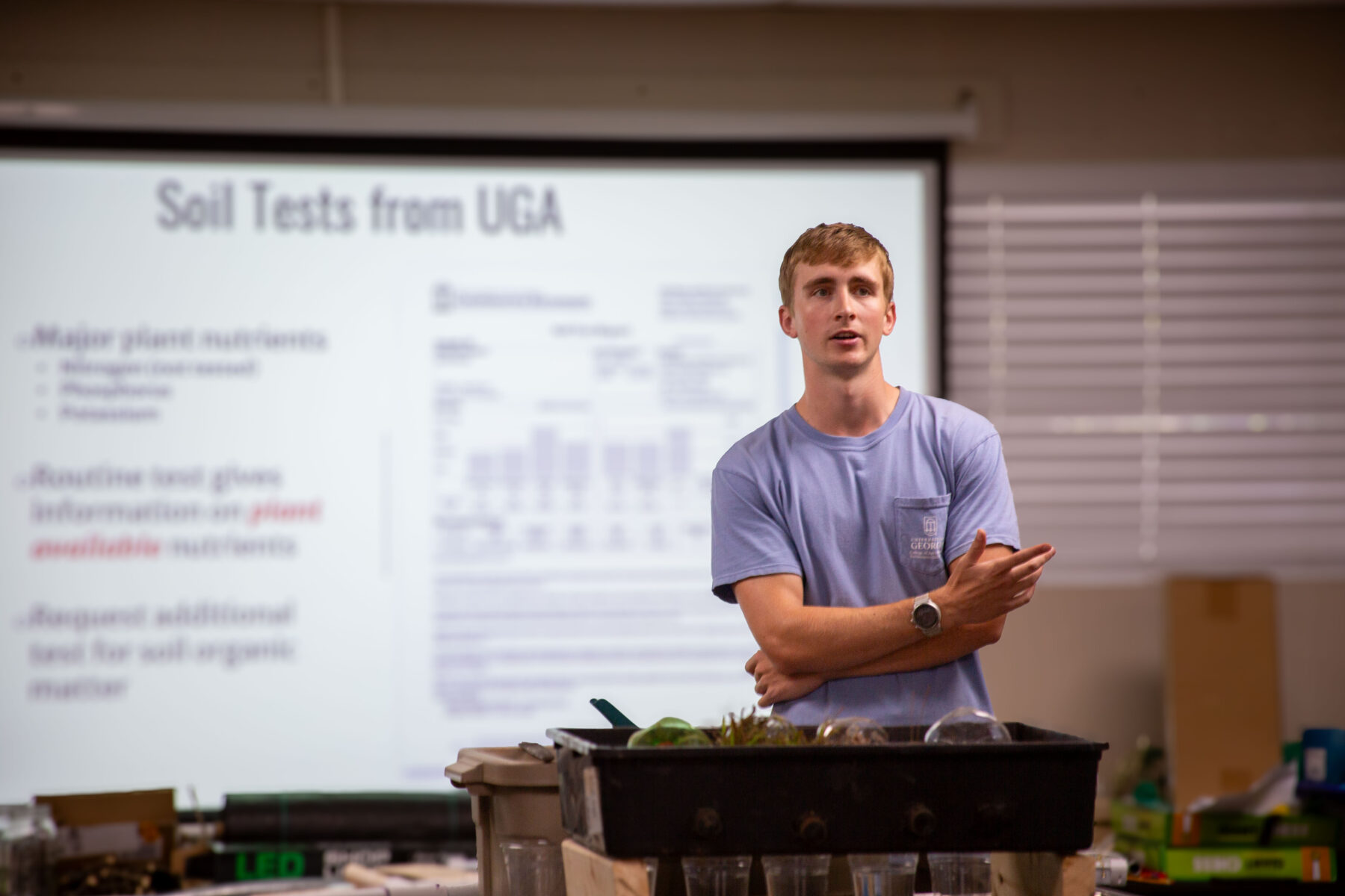 A man presenting Soil Tests from UGA.