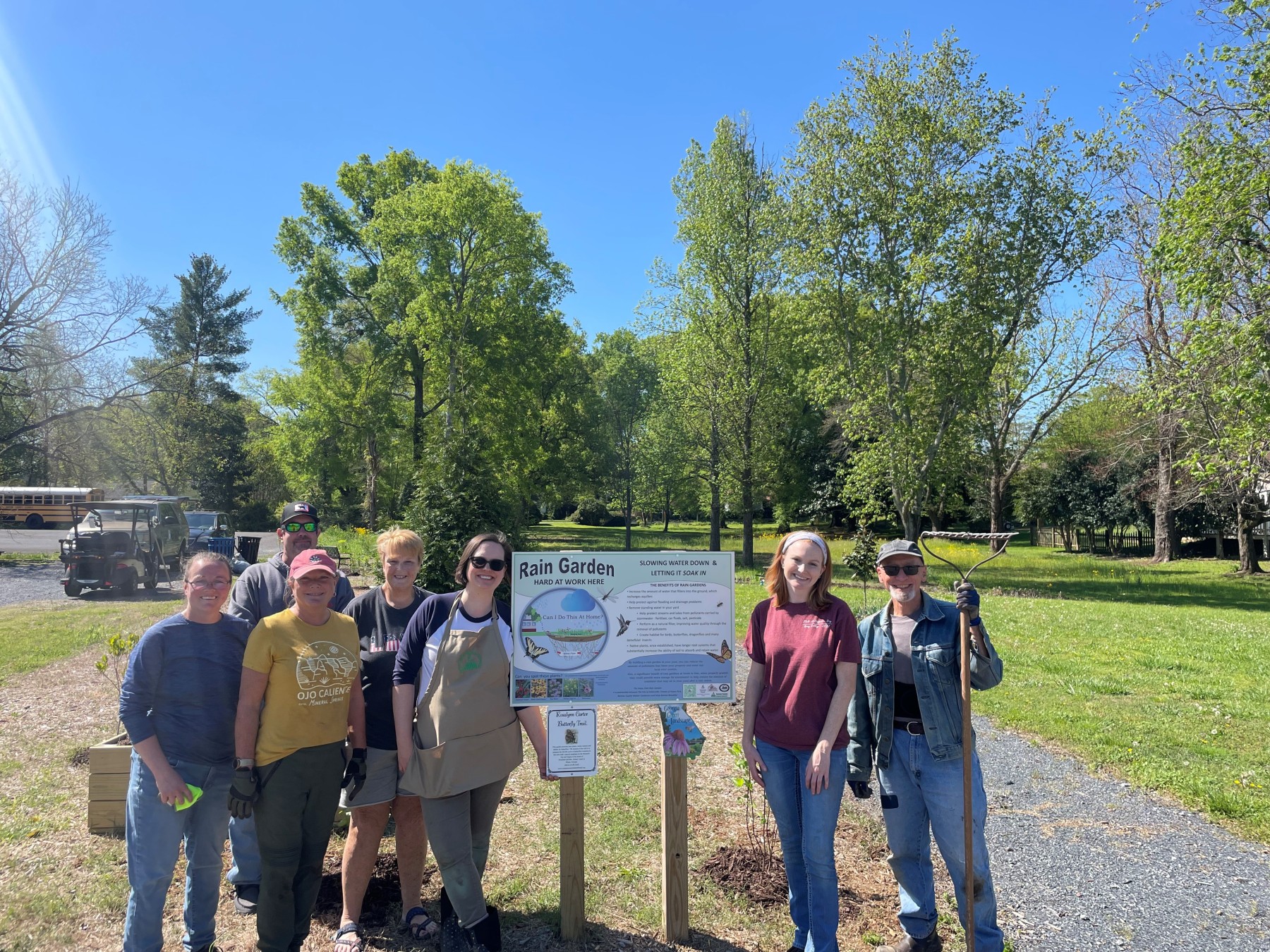 Volunteer group photo by Hayes Park sign