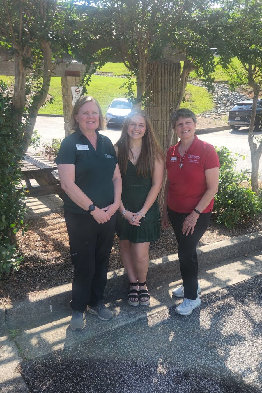 Alanah Romaella-Hall is pictured with Mary Carol Sheffield, County Extension Coordinator, and Master Gardener Extension Volunteer, Becky Mroczkowski.