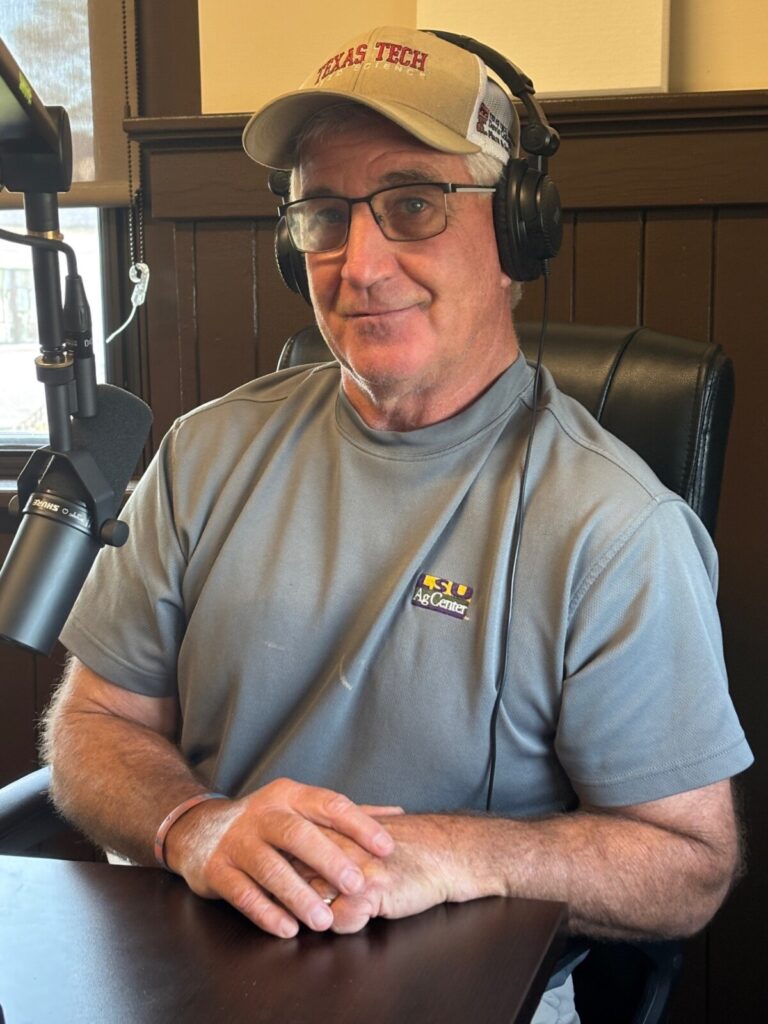 Dr. Prostko styling his Texas Tech and LSU merc.